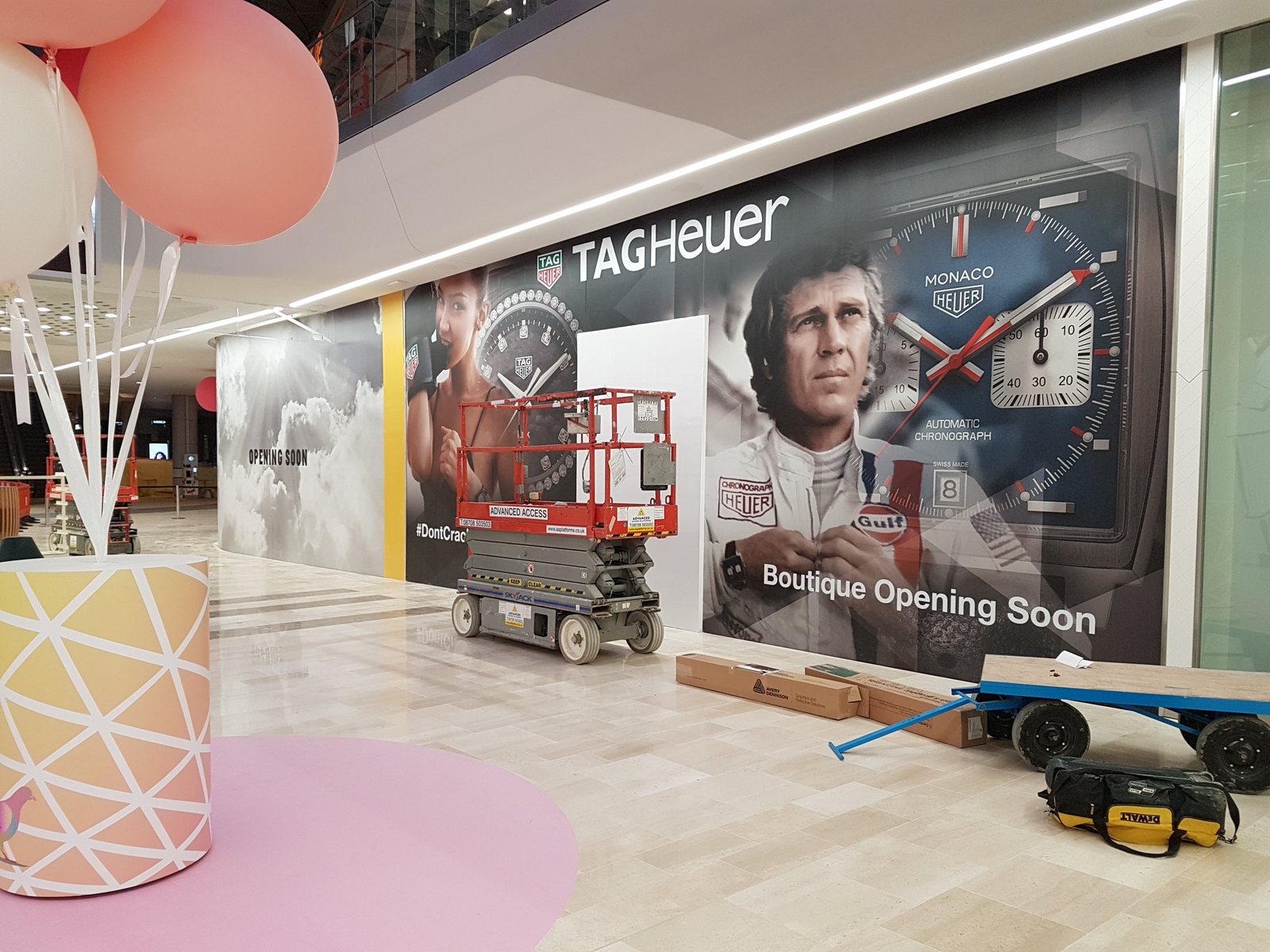 Large format printed graphics on a retail hoarding
